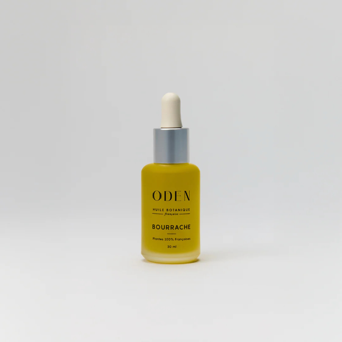Yellow bottle with a white cap on a light gray background